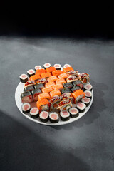 Assorted sushi and maki rolls platter with tuna, salmon, and eel, perfect for a Japanese cuisine experience