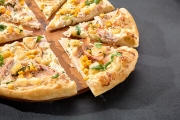 Hawaiian pizza with chicken, pineapple, and corn, a sweet and savory combination on a perfectly...
