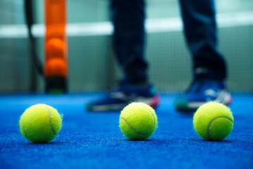 Closeup of tennis ball on court
