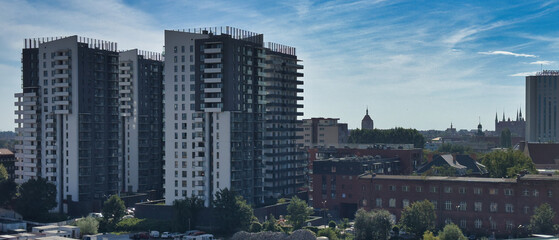 Fototapeta premium City skyscrapers. View of a housing estate with tall buildings