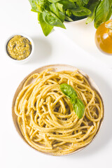 Spaghetti pasta with pesto sauce, basil, cashew and parmesan. Ingredients. 