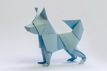Origami figure of a dog. Studio photography with white background