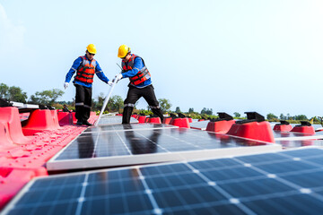 Male workers repair Floating solar panels on water lake. Engineers construct on site Floating solar panels at sun light. clean energy for future living. Industrial Renewable energy of green power.