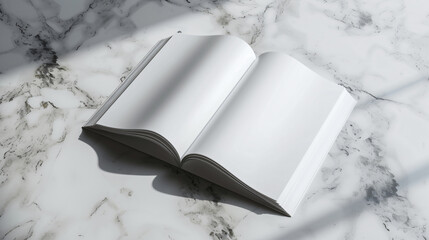 A visually striking stock image of a magazine mockup spread open on a sleek marble surface. The blank pages are elegantly positioned, casting soft shadows that add depth and dimension to the