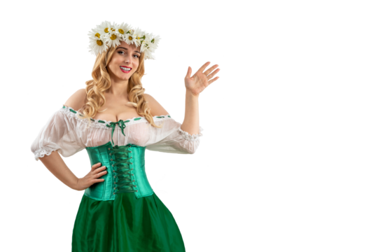 Midsummer woman during traditional solstice festival. Blonde girl with wreath daisies flowers in her hair celebrating summer party.