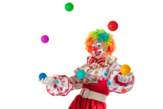 Funny clown juggler. Entertainer professional actor in colorful suit and wig juggling with colorful balls. Joker jester, pantomime, mime with clown whiteface makeup at event, kids party, circus