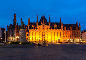 Fototapeta na wymiar Provincial Court building on Market square (Grote markt) at night, Bruges, Belgium