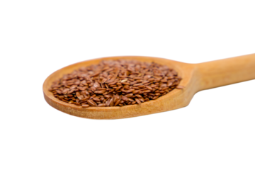 flax seeds in wooden spoon isolated on white background with clipping path