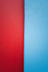 Fototapeta premium Red and blue painting on a house facade in San Cristobal de las Casas, Mexico