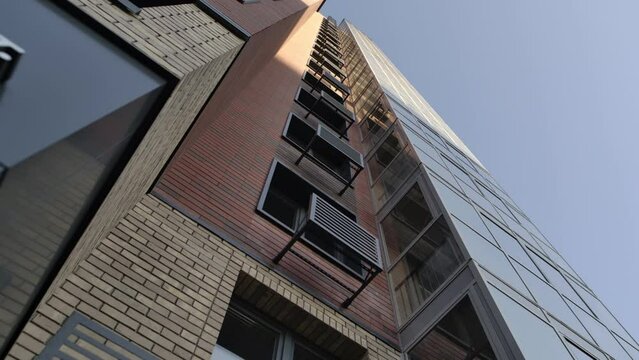 Stripe pattern building adds aesthetic charm to urban scenery. Downtown district business center stands as focal point in bustling hub