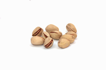Pistachio nuts, pistachios close up. Isolated on a white background.