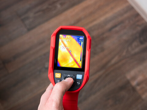 Thermal Imaging of Underfloor Heating. Checking for leakage of the water floor under the laminate