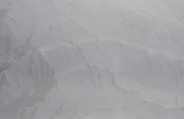 Perennial snow on the Alps in Switserland as seen from above. Very subtle nature background