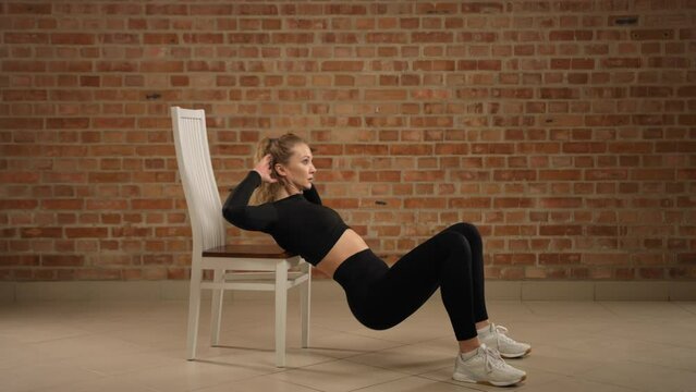 A professional fitness trainer in a modern studio performs hip thrusts with precision, aiming to strengthen glutes and enhance core stability for clients. Camera 8K RAW. 