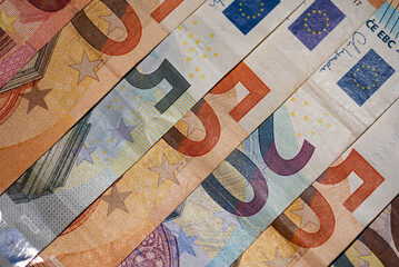 Background of euro bills in oblique