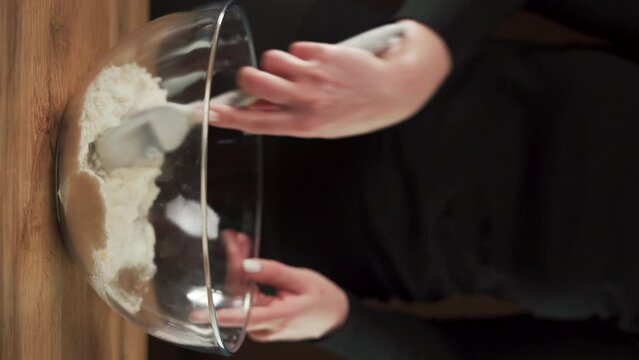 Recipe step by step. The process of making macarons cookies. Cooking dough in a bowl.