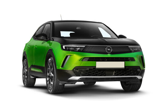Izmir, Turkey - December 23, 2023: Studio shot of a green 2022 Opel Mokka showing its right side with a partial front view on a transparent background, highlighting the vehicle&rsquo;s design