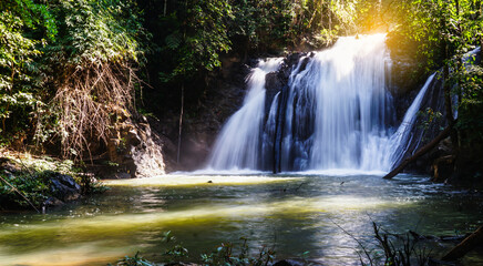 Thung Nang Khruan Waterfall with sunlight in Lam Khlong Ngu national park view in Kanchanaburi...