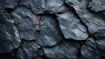 Dark gray rough rock surface texture background