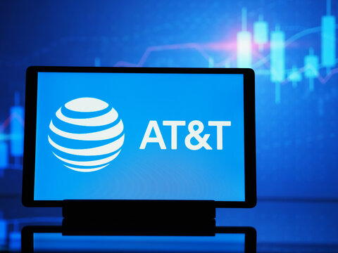In this photo illustration, AT&T Inc. (American Telephone and Telegraph) logo seen displayed on a tablet