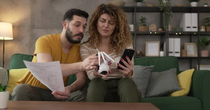 Couple at home connect and install cctv security surveillance camera