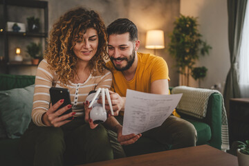 Couple at home connect and install cctv security surveillance camera