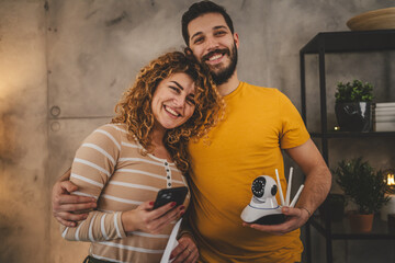 Couple at home connect and install cctv security surveillance camera