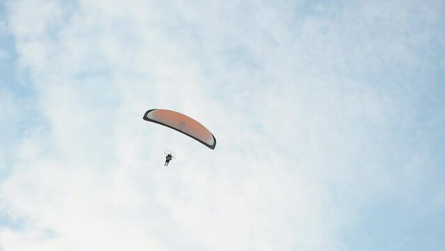 A man flies a Powered Parachute