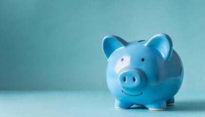 blue piggy bank isolated on a blue background