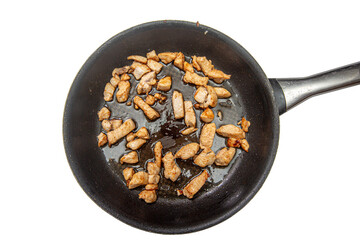 The cook roasts pieces of chicken or pork in a frying pan