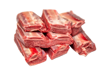 Raw beef rib cuts are placed on a white surface, separated from any other elements.