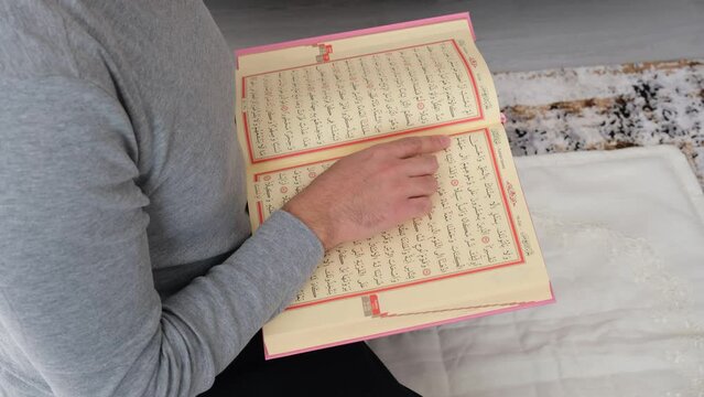 Muslim reading Quran