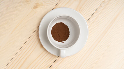 freeze-dried coffee, Instant coffee in white cup on wooden background, the view from top.