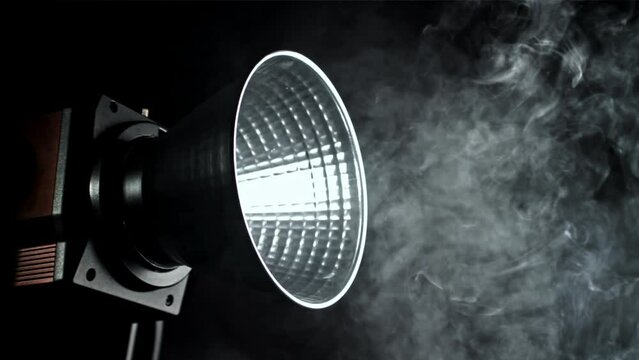 Smoke in studio with lighting projektor. Filmed on a high-speed camera at 1000 fps. High quality FullHD footage