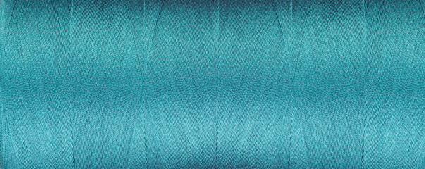 texture of threads for a sewing machine blue colors on a white background