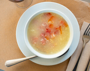 Appetizing soup with minced meat and noodles served in bowl