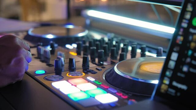 DJ Sound mixer at night event, musical equipment of DJ at event. Close up shot of 