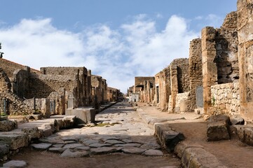 Via dell'Abbondanza was the main street of Pompeii, a bustling thoroughfare lined with shops,...