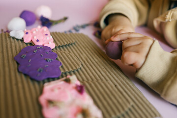 A child sculpts from plasticine, an idea for an activity