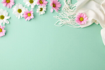 Whispers of spring: a canvas of flowers and warm sentiments. Top view photo of white scarf,...