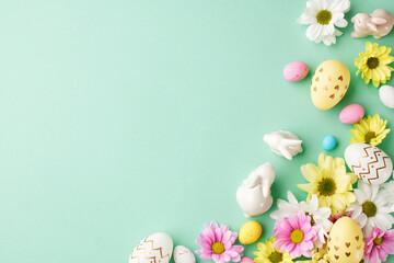 Springtime splendor: Easter's bloom. Top view shot of delightful collection of Easter eggs, white...