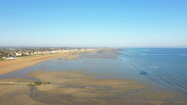 The Channel Sea at Sword beach in Europe, France, Normandy, towards Caen, Lion sur Mer, in spring, on a sunny day.