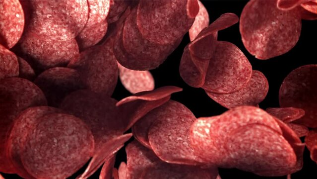 Sliced salami flies up and falls down. Filmed on a high-speed camera at 1000 fps. High quality FullHD footage