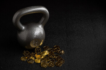 St. Patrick’s Day fitness, silver powder coated iron kettlebell on a gym floor with decorative...