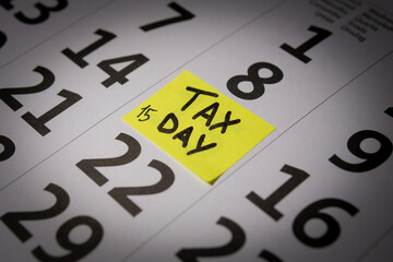 Red tack in calendar pointing at April 15th 2024, Tax Day in the USA for 2023 earnings. High quality photo