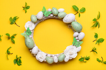 Naklejka na ściany i meble Easter wreath with flowers, eggs and butterflies on yellow background