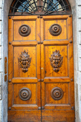 Fototapeta premium Wooden Door in Old Town of Siena - Italy