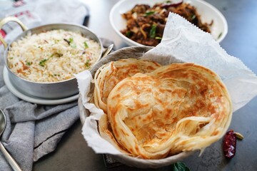 Kerala beef fry roast served with parotta and ghee rice - Malabar Iftar feast