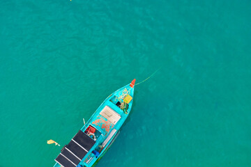 Aerial view from the cable car to the national Vietnamese wooden fishing boats on sea An Thoi harbor. Phu Quoc island, Vietnam.