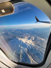Fototapeta premium Aerial view of Mt. Adams in the winter, as seen from a commercial aircraft - Washington, USA